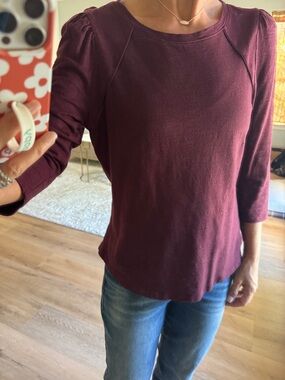 White House Black Market maroon 3/4 sleeve blouse. Size M. Cute ruffle shoulder